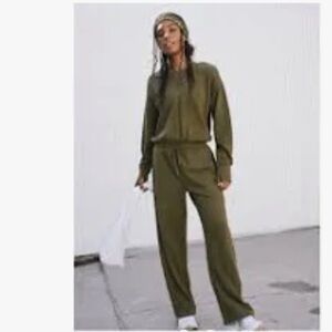 Free People Movement Settle Down open back Onsie in olive color oversized XS